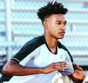 JUSTYN KNIGHT training outdoors