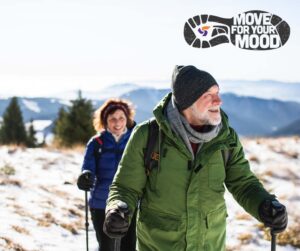 older couple trekking