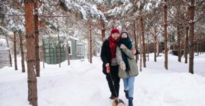 couple walking a dog