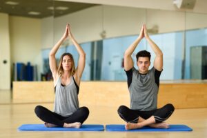 Couple doing yoga