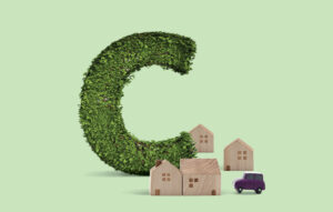 A C-shaped bush surrounded by tiny wood houses and a purple car. 