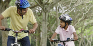 dad and daughter cycling