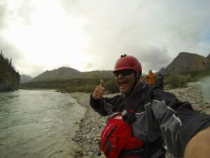 KALIN PALLETT smiling in a river