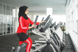 woman using elliptical