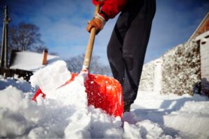 A person shoveling snow