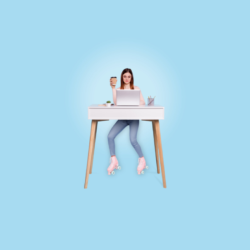 A woman in rolling skates working at standing desk