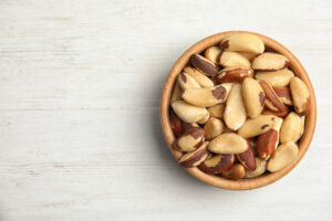 Brazil nuts, one of many foods that can boost your mood and energy, in a bowl