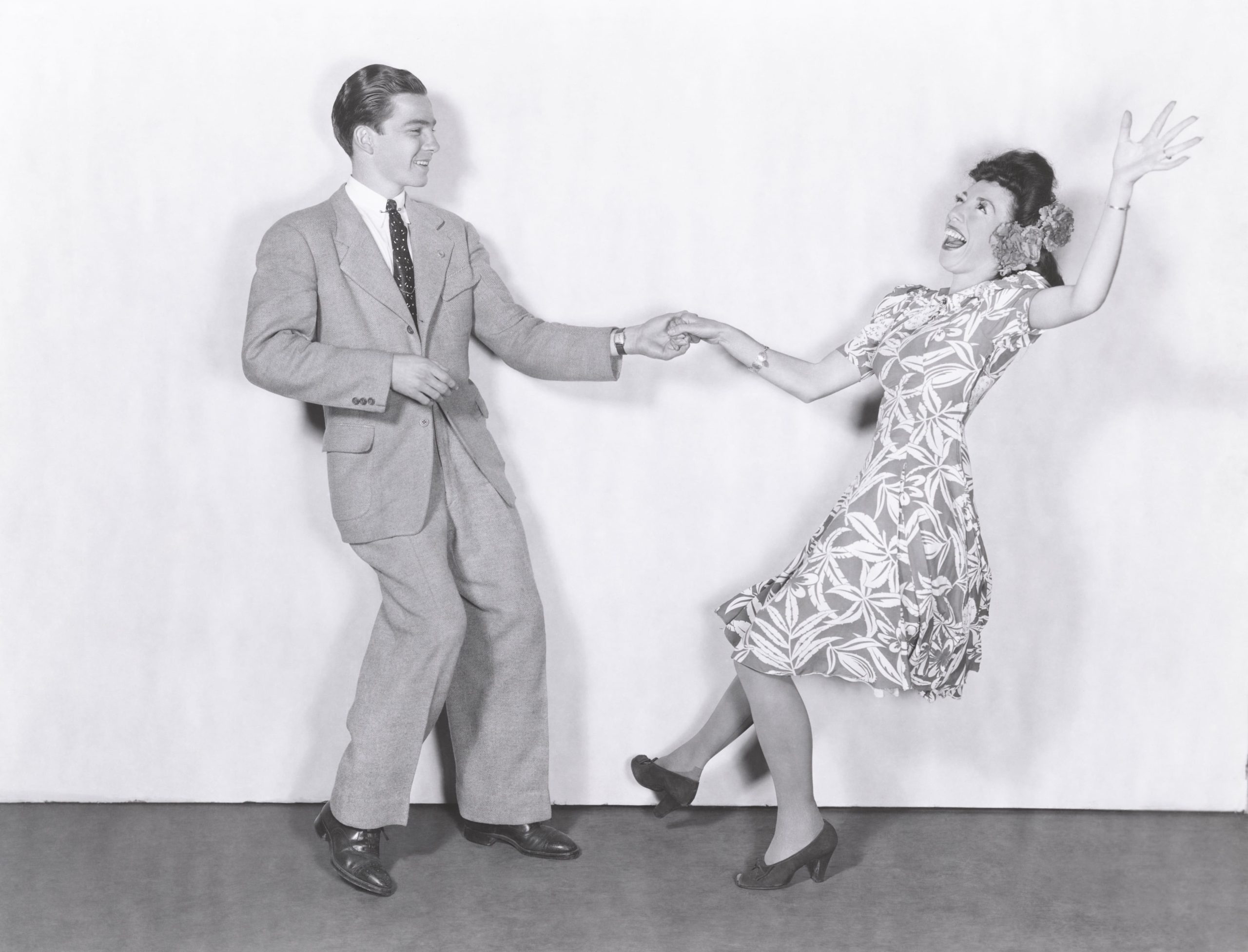 Two people swing dancing Two people swing dancing