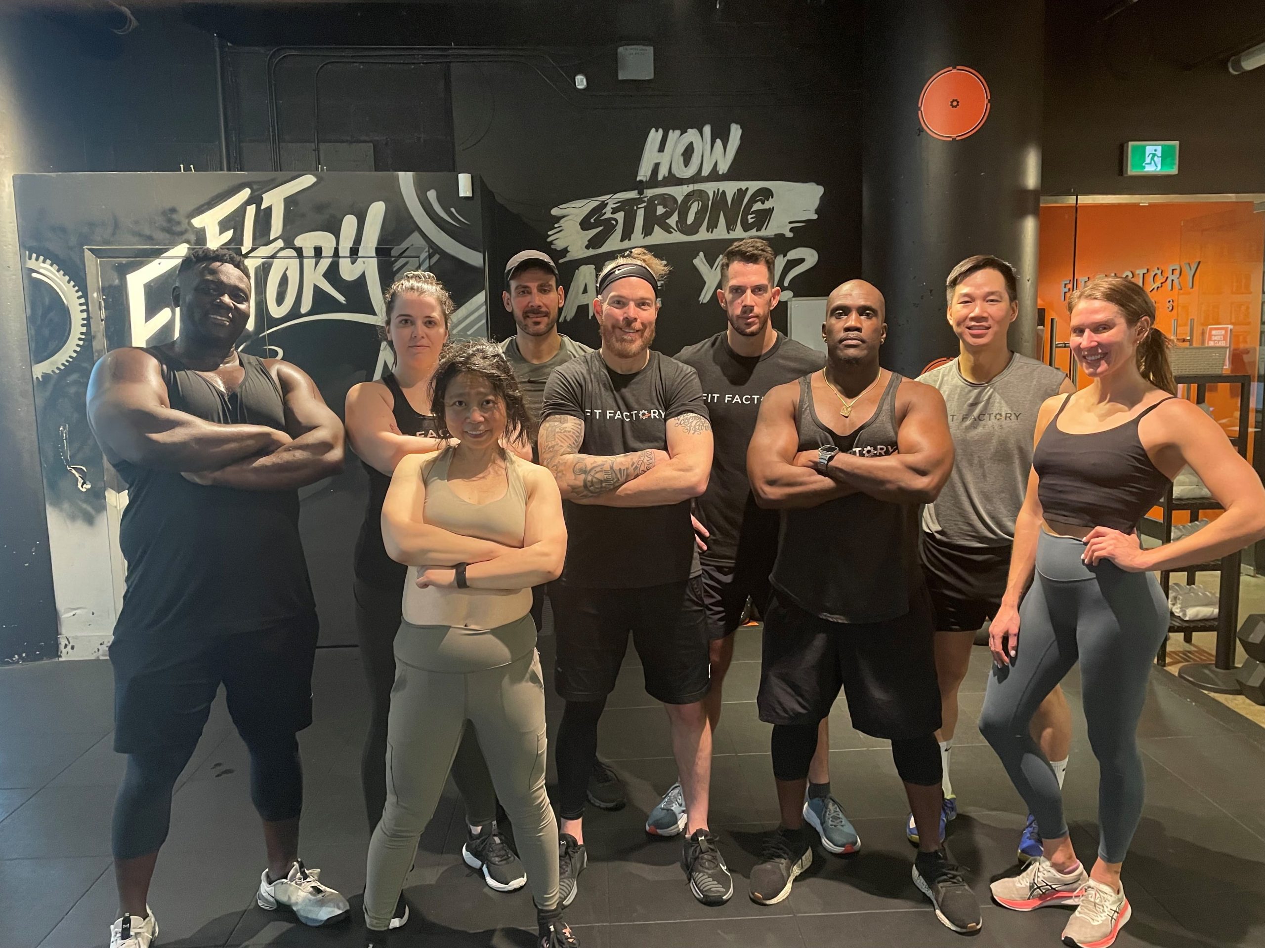 A group of bodybuilders posing for a photo. A group of bodybuilders posing for a photo.