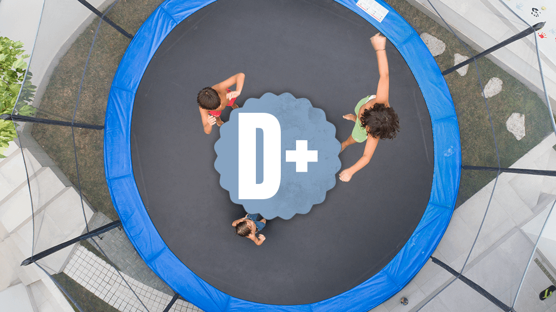 Ariel view of children playing on a trampoline below a D+ grade. Ariel view of children playing on a trampoline below a D+ grade.